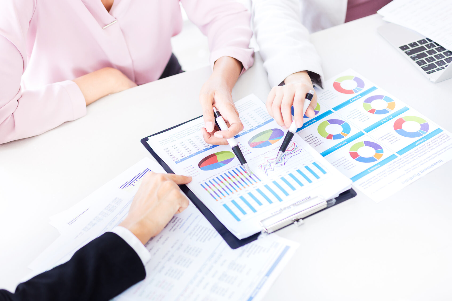 business team discuss and analyze financial annual report at off